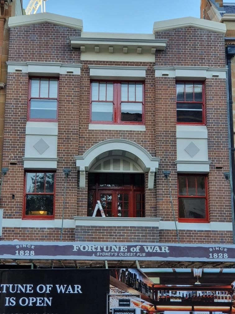 Historic brick pub facade restoration — Sydney