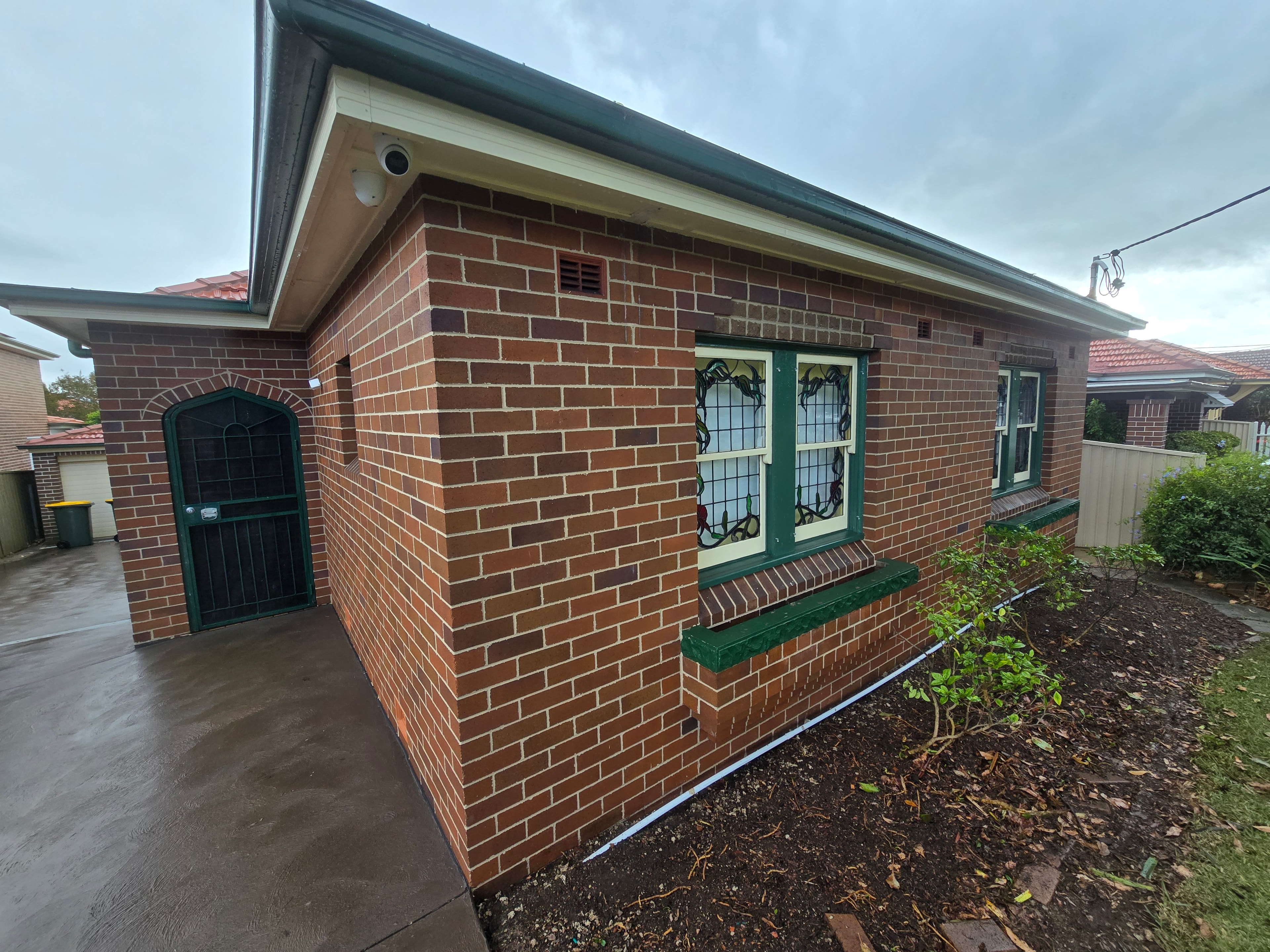 Brick house with tiled roof — Sydney