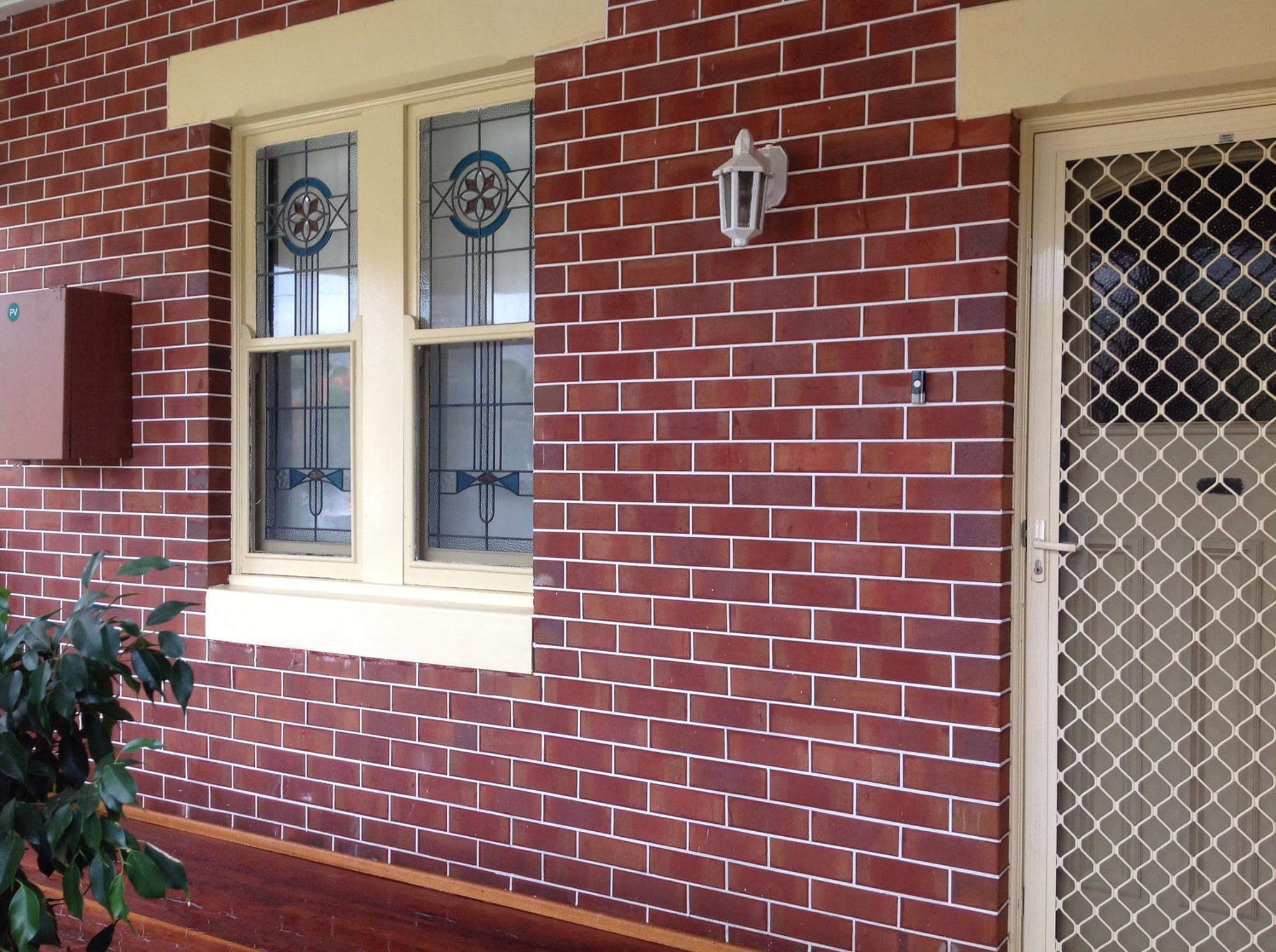 Brick building facade restoration — Sydney