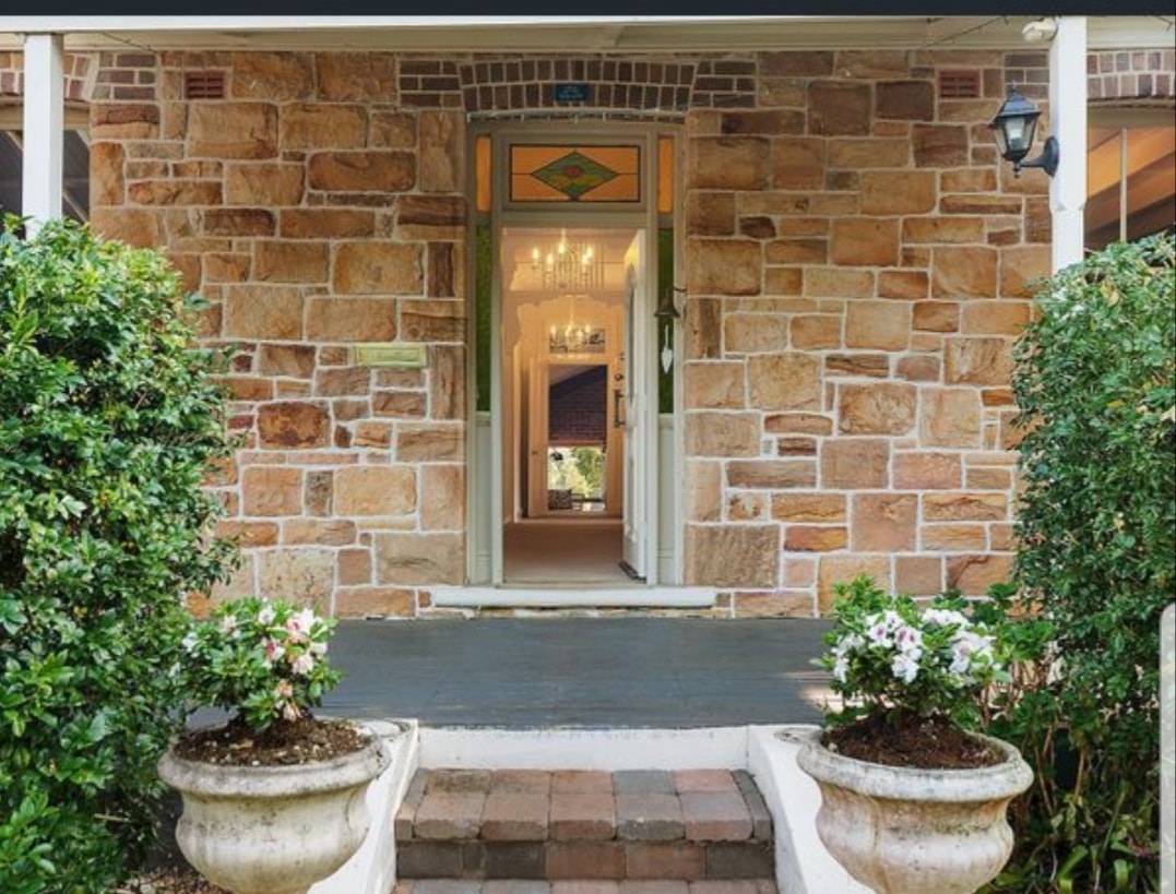 Stone restoration — sandstone facade with ornate entrance